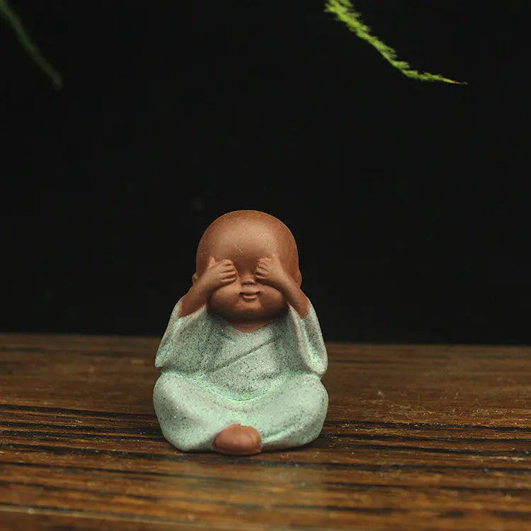 Buddha Padmasana Four Little Monks in purple clay style Buddha padmasana