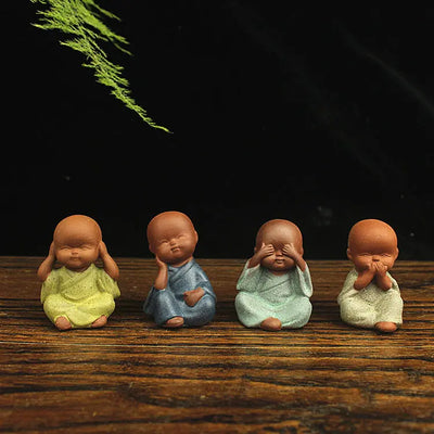 Buddha Padmasana Four Little Monks in purple clay style Buddha padmasana