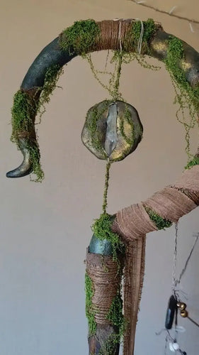 Moss Whisper crystal wand Buddha padmasana