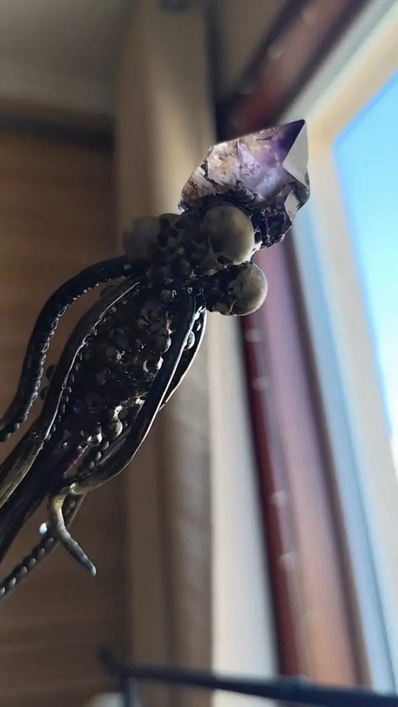 OctopusSkull Wand Buddha padmasana