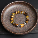 Pulsera de la fortuna y la prosperidad con cuentas de ojo de tigre de Buddha Padmasana