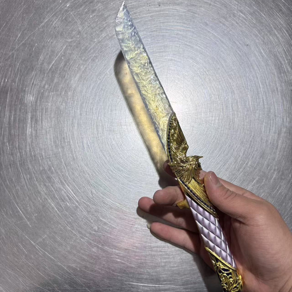 Dark Star: Angel Edition Dagger - Premium hand-forged replica with iridescent opal-inspired blade and solid gold metal hilt, isolated on pure black background.