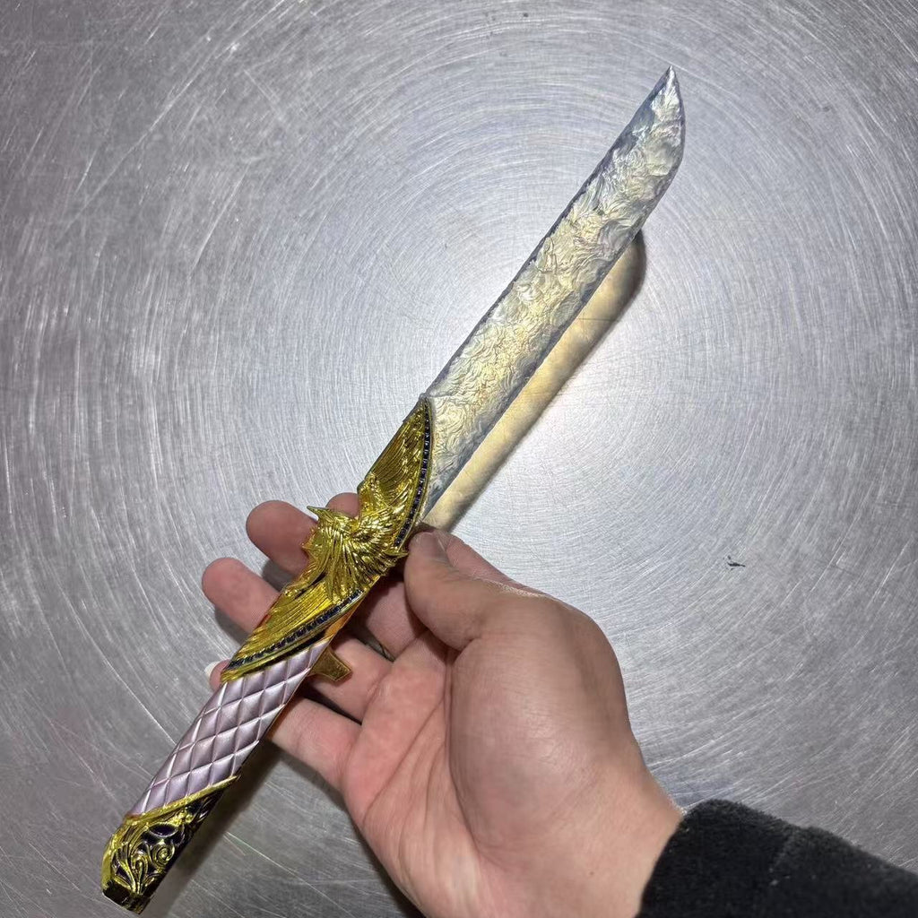 Full view of the 13.8 inch (35 cm) Dark Star Angel Dagger held in hand, demonstrating its substantial scale and lightweight feel as a collector's artisan prop