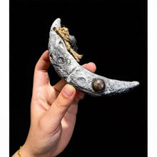 Cargar imagen en el visor de la galería, Premium handmade crescent moon Witchblade pendant showcased on a black background. Features realistic lunar crater texture, embedded gemstones (Labradorite/Moonstone), and a mystical crystal charm. Ideal for spiritual rituals and esoteric practices.