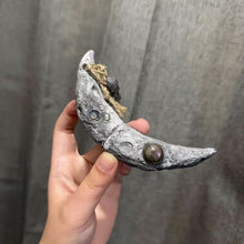 Cargar imagen en el visor de la galería, Handcrafted Crescent Moon Witchblade Pendant in Silver. Features realistic lunar crater texture, embedded Labradorite &amp; Moonstone, and a Quartz charm. Durable, waterproof statement jewelry for Wiccan rituals.